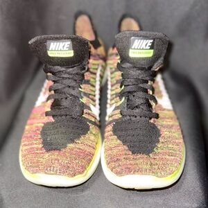 Nike Free RN Flyknit OC running shoes in a multicolor Flyknit material.